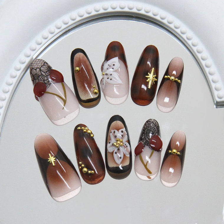 Brown French Almond Press-On Nails with Cherry Flowers — detail